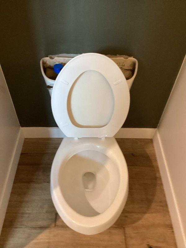 Responded to emergency call for severely clogged toilet causing active overflow and water damage in bathroom area. Upon arrival, assessed the situation and determined complete blockage in toilet trap. Utilized toilet auger to effectively clear the obstruction and restore proper drainage function. Verified toilet flushed properly with no further leaking or overflow issues. Left fixture in operational condition.