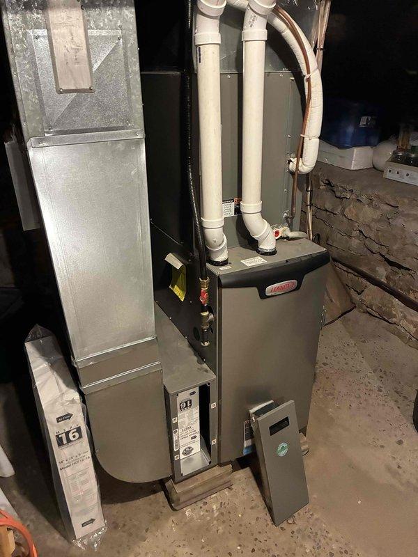 Completed annual preventative maintenance and tune-up on 4-year-old Lennox air conditioning system. Performed comprehensive inspection of all components including refrigerant levels, electrical connections, condensate drain lines, and airflow measurements. All system parameters tested within manufacturer specifications with no deficiencies noted. System operating normally with no customer-reported issues prior to service.