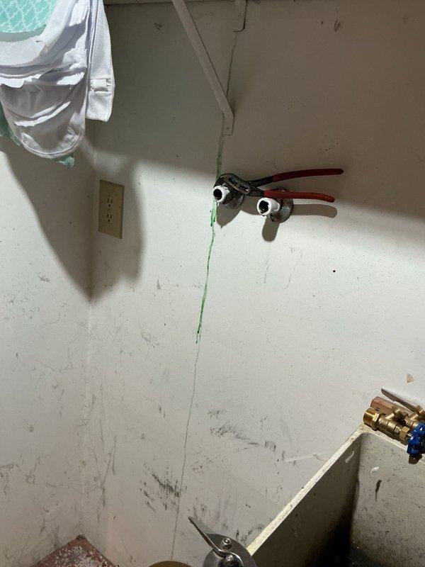 Responded to a plumbing service call to replace malfunctioning washing machine shut-off valves in a utility area. Removed the old broken hot and cold water supply valves and installed two new brass washing machine shut-off valves, restoring proper water control for the appliance. All connections were tested for leaks and confirmed operational upon completion.