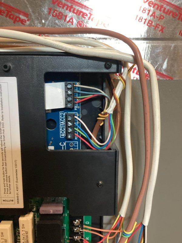 Responded to no cooling complaint on 9-month-old system with thermostat connectivity issues. Installed S40 control board, replaced malfunctioning thermostat, and rewired connections to integrate properly with new control board. Verified system operation with unit cooling effectively upon completion, and advised customer to report any further concerns.