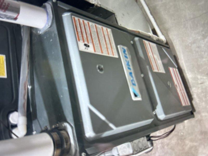 Completed routine cooling maintenance tune-up on a 6-year-old residential air conditioning system as part of a recurring maintenance agreement. Performed comprehensive system inspection and diagnostics, discovering the unit was operating with low refrigerant charge. Installed customer-provided programmable thermostat, completing all necessary wiring connections to the HVAC control board and ensuring proper system communication. Homeowner elected to defer refrigerant recharge at this time to monitor system performance before proceeding with repair.