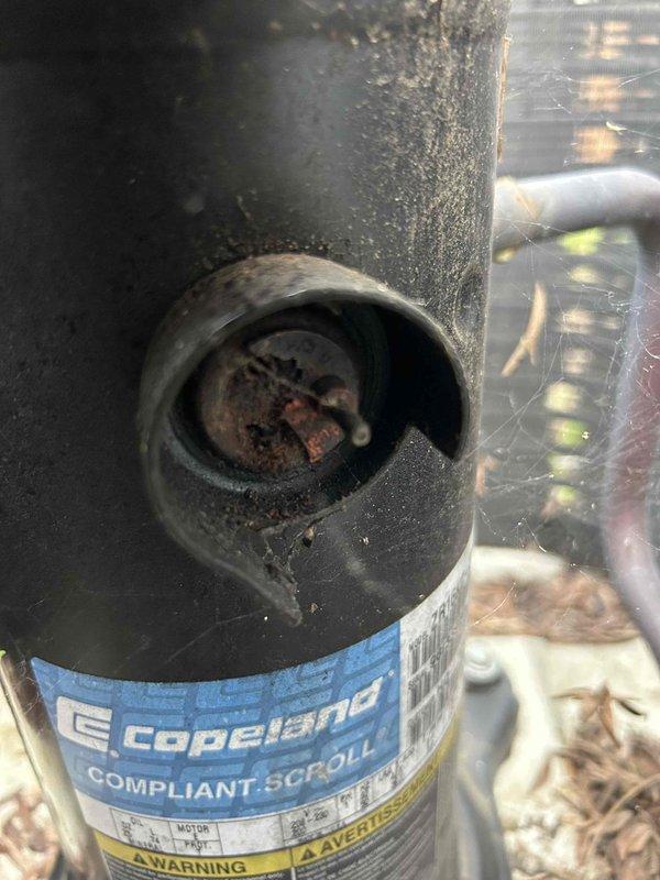 Responded to no cooling complaint on residential air conditioning system. Upon inspection of outdoor condensing unit, found compressor with severely deteriorated terminals and significant internal corrosion. Compressor terminals were non-existent due to age and environmental damage. Given the extent of deterioration, age of existing equipment (10+ years), and cost-effectiveness of repair versus replacement, recommended complete system replacement rather than compressor replacement alone. Customer approved full unit replacement. Removed old condensing unit and installed new outdoor air conditioning unit. Completed all refrigerant line connections, electrical wiring, and system startup. Verified proper operation of new equipment with system running and cooling effectively. System now operational and providing adequate cooling to residence.