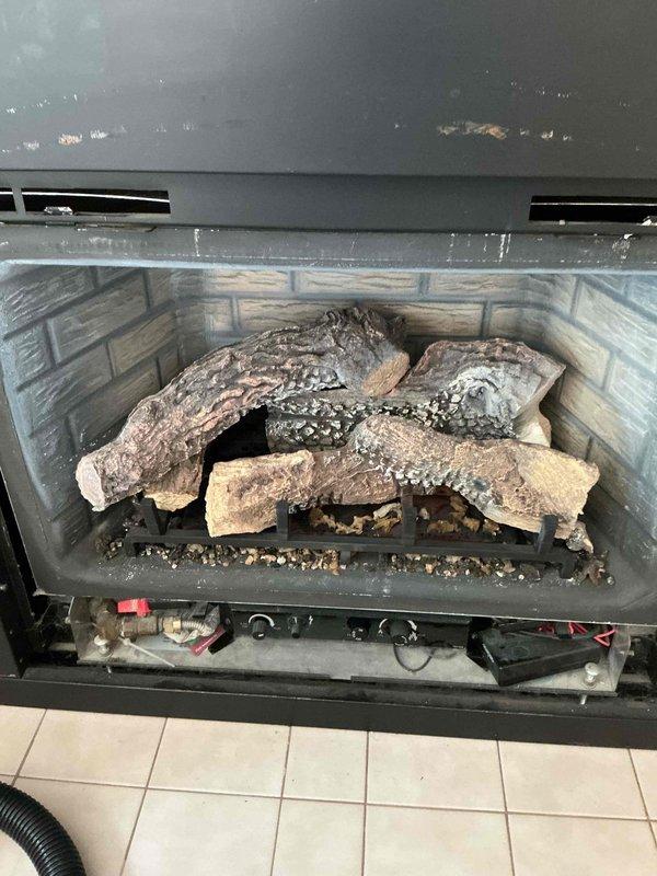 Completed annual maintenance on gas fireplace unit model X6364. Performed comprehensive tune-up including thorough cleaning and vacuuming of firebox, burner assembly, and log set. Verified operational functionality of all components and confirmed unit is operating safely and efficiently.