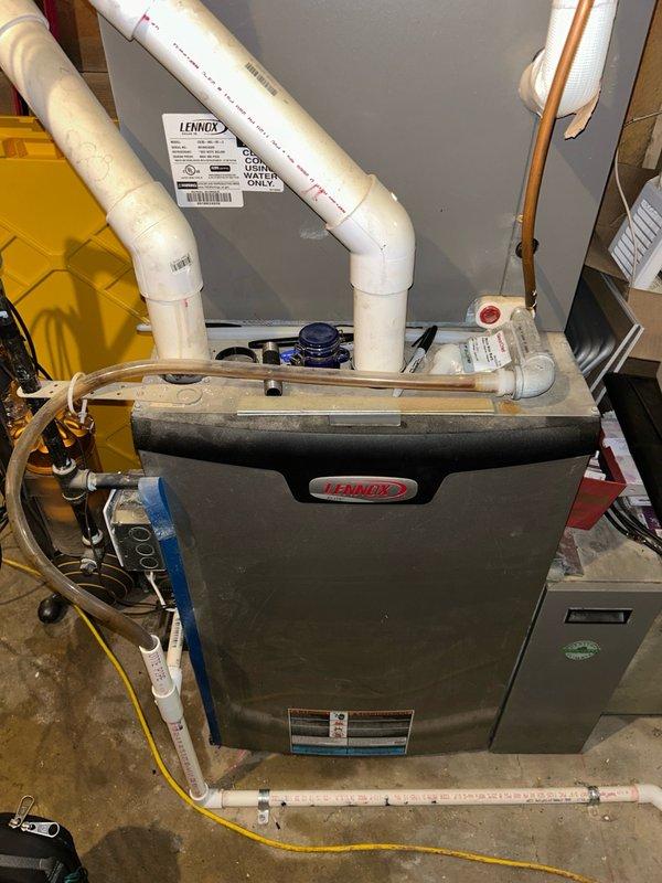 Responded to a no cooling call on a 7-year-old AC system. Upon arrival, inspected the outdoor unit and found the condenser coils dirty; cleaned thoroughly. Verified contactor and capacitor were operating normally with proper 240V power supply to the outdoor unit. Traced power issue to the indoor furnace where no 120V was present. Located tripped breaker at electrical panel, reset breaker, and restored power to the system. Tested system operation and confirmed unit running properly. Performed refrigerant pressure readings which were within manufacturer specifications. Recommended follow-up electrical inspection to determine root cause of breaker trip and prevent future occurrences.