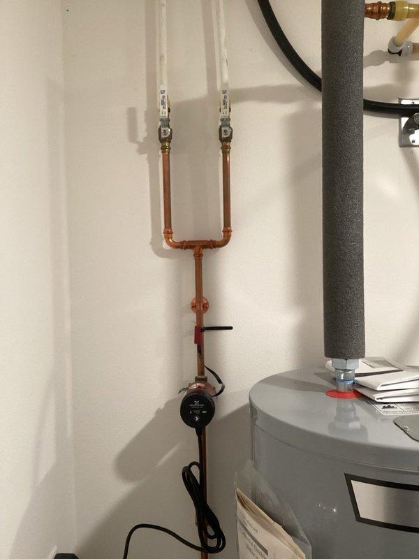Responded to no hot water complaint on 4-year-old AO Smith electric water heater. Upon inspection, found ECO (energy cutoff) switch had tripped, cutting power to thermostats and heating elements. Reset ECO switch, restoring power to all components. Adjusted thermostat settings slightly lower to reduce likelihood of future trips. Customer reported this issue occurs approximately once per year, but root cause remains undetermined at this time. Recommend bringing multimeter on next service call if problem recurs to perform comprehensive electrical diagnostics.