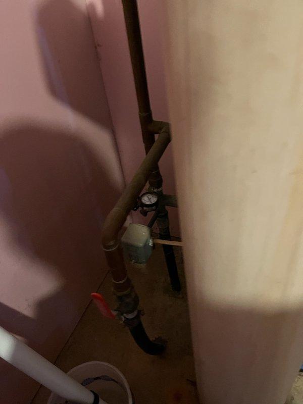 Responded to low water pressure complaint with fluctuating pressure readings between 8-12 PSI. Diagnosed 30-year-old pressure tank as waterlogged, causing inadequate pressure maintenance and constant fluctuation in the water system. Provided estimate for pressure tank replacement and coordinated scheduling for installation of new pressure tank, water softener, and filtration system to resolve the issue and improve overall water quality.