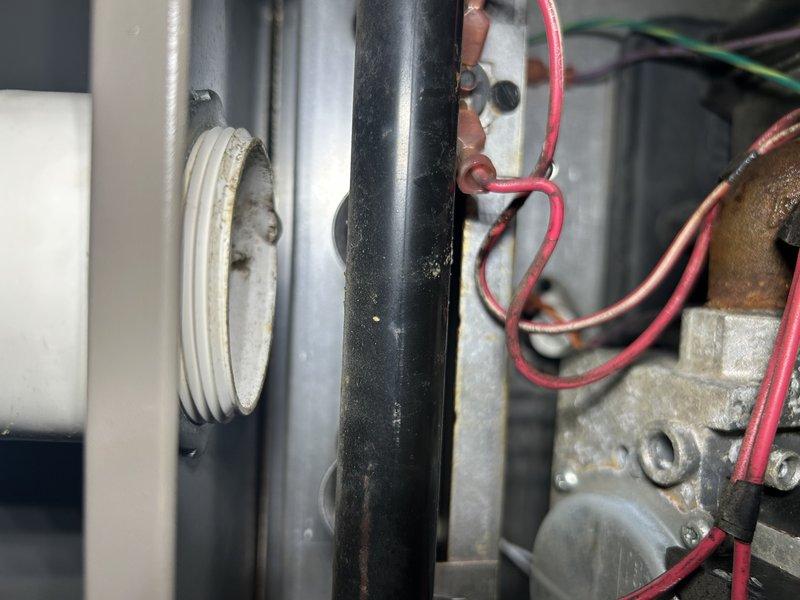 Completed comprehensive cooling system maintenance on Lennox air conditioning unit. Performed operational testing of AC system, inspected and serviced furnace components, cleared condensate drain line, and installed new air filter. Exterior service included component inspection and condenser coil cleaning. Identified capacitor reading below factory specifications and loose wiring connections at contactor, which were tightened to proper torque. Discovered moisture intrusion from intake line dripping into furnace due to high humidity conditions. Replaced deficient capacitor to restore proper system performance and presented options for inline drain kit installation to address condensation issue and prevent future moisture problems.