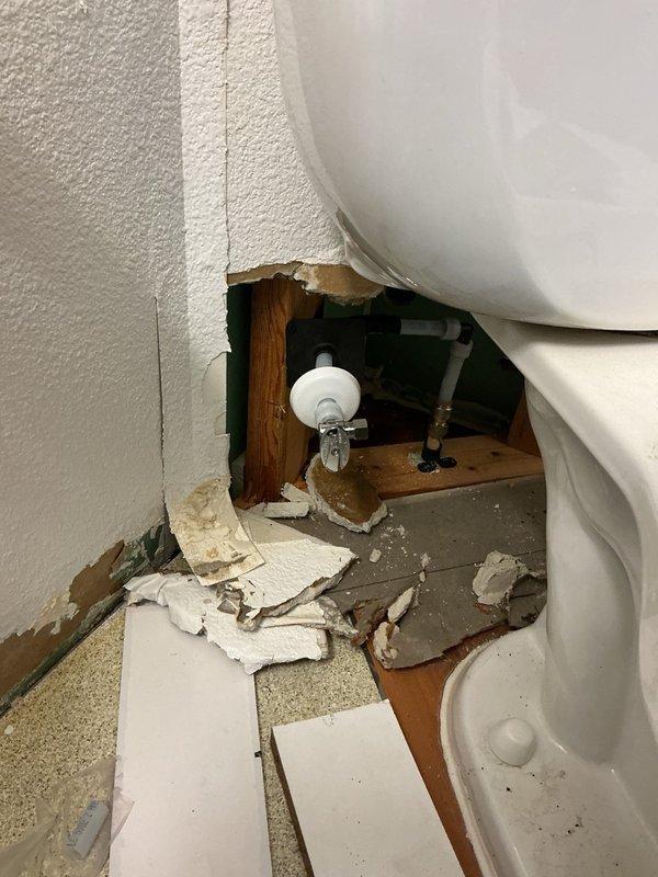 Responded to commercial water leak emergency at hotel guest room on third floor. Upon arrival, found CPVC waterline broken off behind toilet within wall cavity. Water supply had been shut off prior to arrival. Inspection revealed the CPVC line had fractured at mounting point, likely due to excessive force during toilet removal combined with material brittleness from age.

Removed damaged section of CPVC waterline and made clean cut to establish solid connection point. Installed PEX adapter fitting to transition from existing CPVC to new PEX piping. Stubbed out new waterline to proper location and installed new shut-off valve. Restored water supply to fixture and conducted 10-minute pressure test to verify system integrity and confirm no active leaks at repair points or connections.