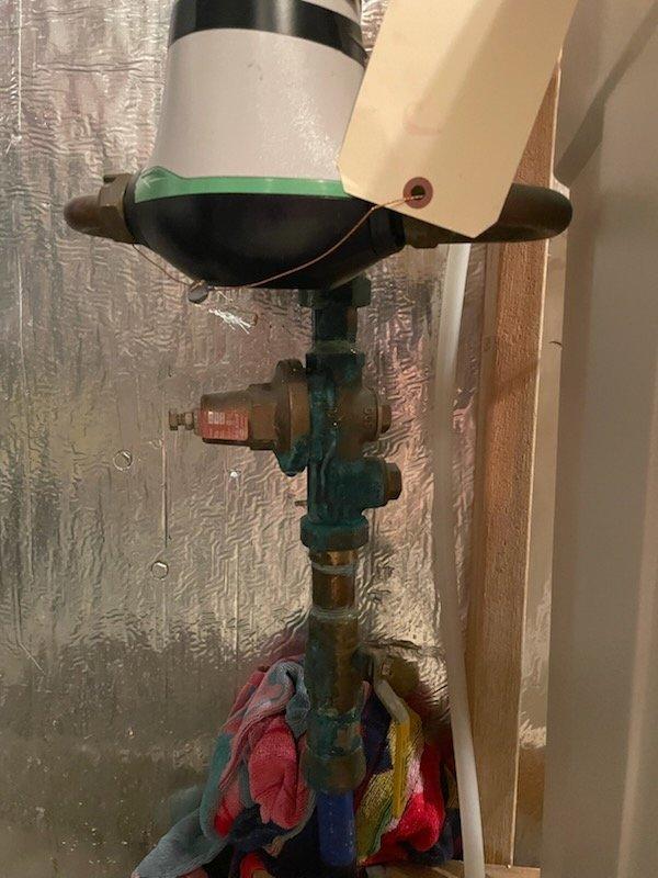 Responded to a slow water leak originating from the pressure reducing valve (PRV) located on the main water line in the basement mechanical room, positioned just below the connection point between the PRV and the city water meter. Upon assessment, confirmed the leak was visible and contained in a plastic basin on the floor, with no immediate need for full water shutoff to the residence. Removed the faulty PRV assembly and installed a replacement unit, ensuring proper connections to both the incoming main water line and downstream plumbing system. Tested the new PRV installation for proper pressure regulation and verified no leaks were present at connection points. System restored to full operation with appropriate water pressure maintained throughout the residence.
