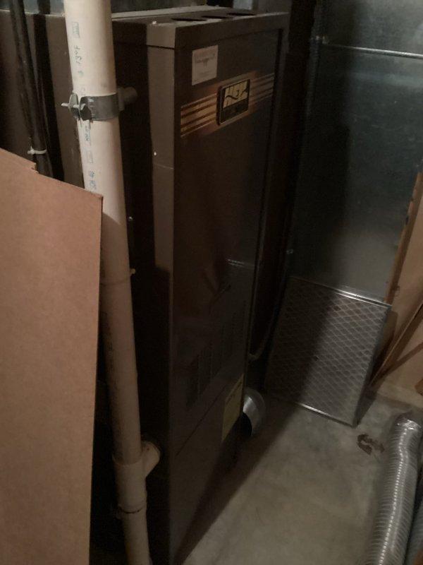 Responded to no-cool complaint on 12-year-old Lennox air conditioning system (Model 13ACXN060-230-12). Upon inspection, found restricted airflow due to dirty air filter and diagnosed system low on refrigerant charge. Replaced filter and identified refrigerant leak requiring further service. During evaluation, discovered original furnace unit still in operation, presenting potential safety and efficiency concerns. Documented equipment conditions with photographs and scheduled follow-up estimate for complete system replacement of both aging furnace and air conditioning units.