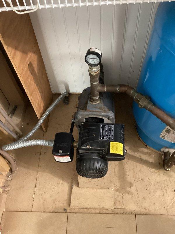 Responded to callback regarding water pump replacement with reported continuous operation and water spray. Upon arrival, tested system by running household fixtures to reduce pressure to 30 PSI. Observed pump engage properly and build pressure to 50 PSI cutoff point. Cycled system three times with consistent performance—pump activated at low pressure, built to 50 PSI, and shut off as designed. Inspected pump installation, pressure tank, piping connections, and pressure switch. No leaks, malfunctions, or abnormalities detected during testing or visual inspection. System operating within normal parameters.