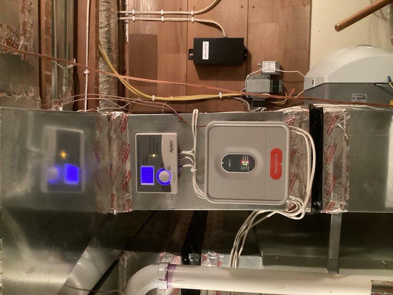 Completed membership A/C maintenance on two residential HVAC systems serving main level and third level zones. On both units, performed comprehensive system checks including evaporator coils, blowers, condensers, contactors, compressors, and refrigerant levels. Replaced air filters with homeowner-provided filters on both systems. Cleaned condenser coils on both units and serviced HRV units. Main level humidifier pad requires replacement at next fall maintenance visit, while third level humidifier pad is new. Cycled and tested all zone dampers; main level dampers operating normally, but identified one third-level damper motor operating roughly with potential failure risk. Provided estimate for damper motor replacement. Both systems confirmed in normal operation upon completion.