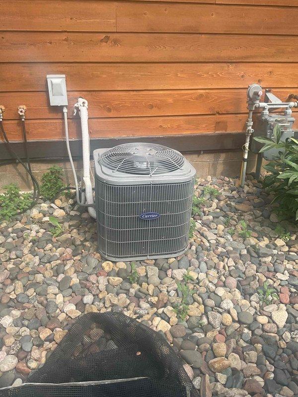 Performed comprehensive annual cooling maintenance tune-up on residential split system, including outdoor Carrier condenser unit and wall-mounted mini-split air handler. Completed full system inspection, verified refrigerant levels and line set integrity, tested electrical connections at disconnect box, inspected condensate drainage, cleaned condenser coils, and confirmed proper airflow and operational performance. No issues identified; system operating within normal parameters with no service recommendations required at this time.