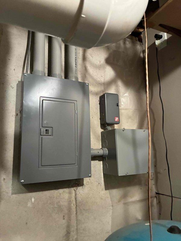 Performed comprehensive maintenance agreement cooling visit for newly occupied residence with multiple HVAC systems. Inspected and serviced main house air conditioning unit, including condenser coil cleaning, electrical component testing (all readings within manufacturer specifications), air filter inspection, and condensate drain line clearing. Refrigerant pressures checked and confirmed proper operation of primary cooling system.

Evaluated two aging R-22 mini-split systems serving detached garage. First unit found with failed capacitor and seized fan motor; second unit had failed capacitor, incorrect contactor installed, and binding fan motor. Due to age of equipment, obsolete refrigerant, and extent of multiple component failures on both units, recommended against repair investment. Provided estimate request for electric baseboard heater installation in basement area for supplemental heating.