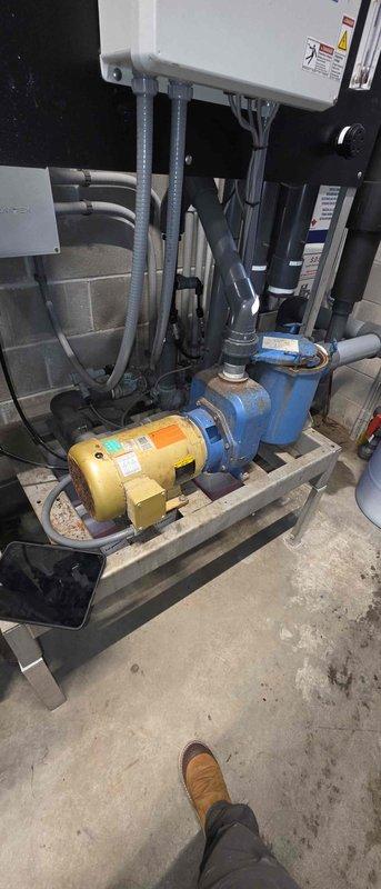 Responded to low water pressure complaint and diagnosed failed foot valve on pump system. Replaced defective foot valve, verified reclaim cycle operation, and inspected complete pump assembly including motor, centrifugal pump, and associated piping to ensure proper system function and adequate pressure restoration.