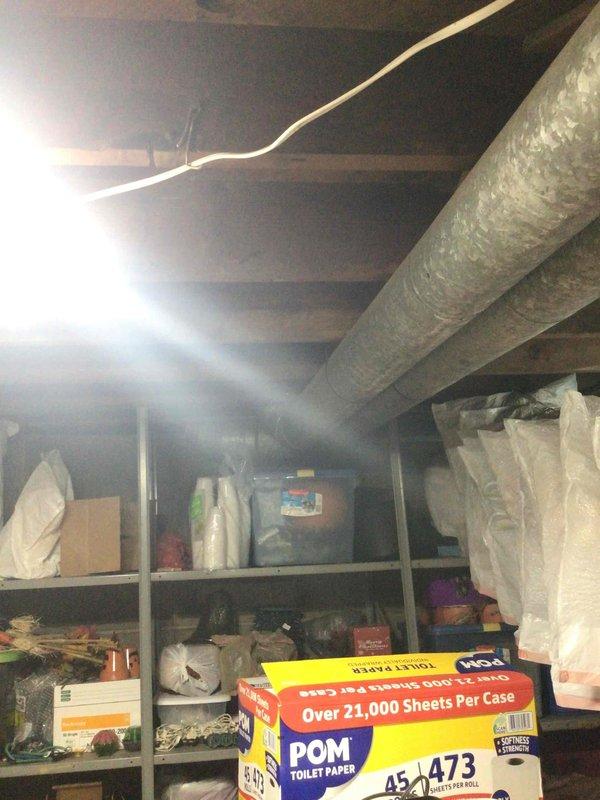 Responded to no cool complaint on 6-year-old system. Upon inspection, found AC unit operating properly with adequate cooling capacity. Customer reported uneven airflow with certain vents delivering weak airflow compared to others. Investigated ductwork configuration in attic and basement areas. Determined that vents with strong airflow were supplied by proper trunk line distribution, while underperforming vents were connected via extended 20-30 foot straight runs without trunk line support. Explained that airflow imbalance was due to inadequate duct design rather than equipment malfunction. Recommended either installing additional trunk line to affected zones or adding supplementary vents to improve air distribution throughout the home.