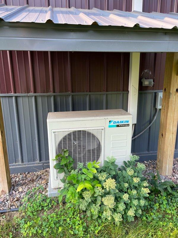 Completed comprehensive maintenance agreement service on Daikin mini-split air conditioning system and boiler. Performed AC tune-up including cleaning and inspection of electrical components on outdoor condenser unit, removed and verified clean filters from indoor head unit, and confirmed proper drainage operation. Conducted boiler inspection of routine components, removed and cleaned trap and igniter assembly with all measurements found within manufacturer specifications. System testing included running mini-split for 15 minutes with temperature split measuring 18-20 degrees, verified proper operation of in-floor heating and domestic hot water functions. All equipment operating as designed with no deficiencies noted.