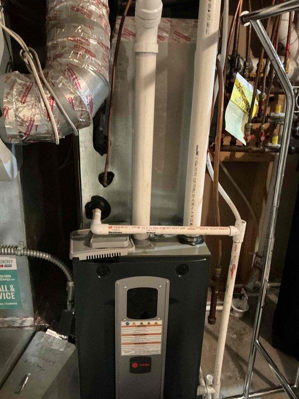 Completed annual cooling maintenance visit on multi-system HVAC installation including basement furnace unit and rooftop condensing units. During inspection, identified weak capacitors affecting system performance. Replaced defective capacitors and installed hard start kits on compressors to improve starting efficiency and extend equipment lifespan.