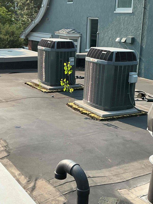 Completed annual cooling maintenance visit on multi-system HVAC installation including basement furnace unit and rooftop condensing units. During inspection, identified weak capacitors affecting system performance. Replaced defective capacitors and installed hard start kits on compressors to improve starting efficiency and extend equipment lifespan.