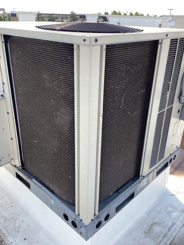 Completed preventive maintenance agreement service on two commercial rooftop units. Replaced return air filters with multiple sizes including 25x20x2, 14x20x2, and 20x20x2 filters. Cleaned condenser coils on both RTUs to ensure optimal heat transfer and system efficiency. Verified proper fan operation and cooling performance on all equipment. Performed comprehensive tune-up procedures and operational checks. Both units operating within normal parameters with no issues reported at time of service completion.