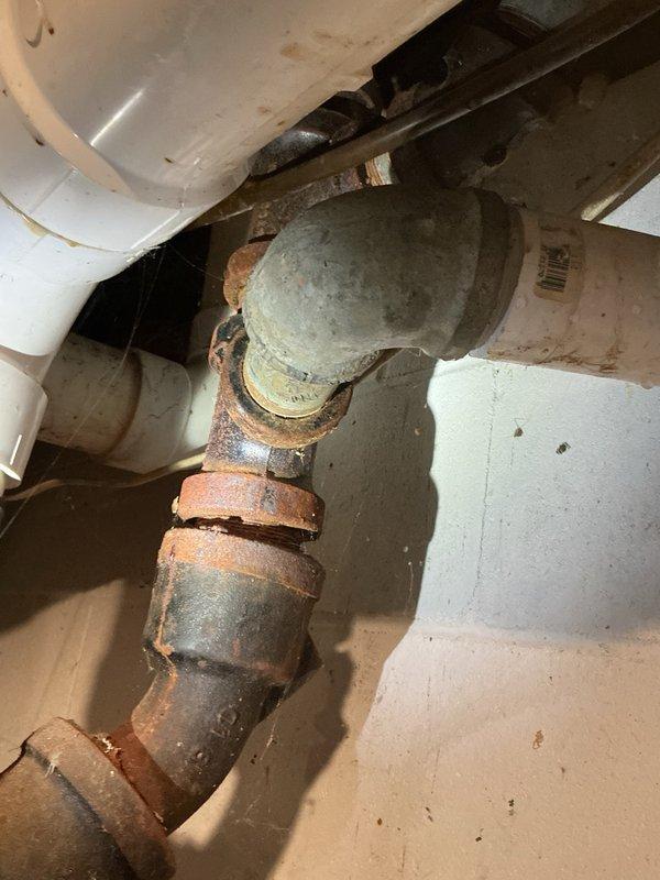 Responded to a kitchen sink backup and toilet leak. Upon inspection, found the kitchen sink drain clogged with grease buildup. Cleared the blockage using a small drain machine and restored proper drainage. Identified active leak at toilet base. Pulled toilet, removed deteriorated wax ring, installed new wax ring, and properly reset toilet to eliminate leak. Both plumbing issues resolved and fixtures returned to normal operation.