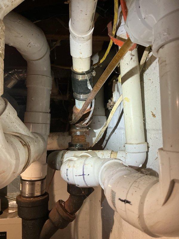 Responded to a kitchen sink backup and toilet leak. Upon inspection, found the kitchen sink drain clogged with grease buildup. Cleared the blockage using a small drain machine and restored proper drainage. Identified active leak at toilet base. Pulled toilet, removed deteriorated wax ring, installed new wax ring, and properly reset toilet to eliminate leak. Both plumbing issues resolved and fixtures returned to normal operation.
