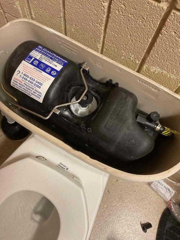 Supplied and installed a Flushmate cartridge kit including duckbill valve and screen assembly to restore proper pressure-assisted flushing operation. Removed toilet tank lid, disconnected existing components, and replaced worn cartridge system with new OEM parts. Tested flush mechanism for proper operation, verified water pressure and fill cycle functionality, and inspected all connections for leaks. Cleaned work area and restored toilet to full operational status. One-year parts and labor warranty included with repair.