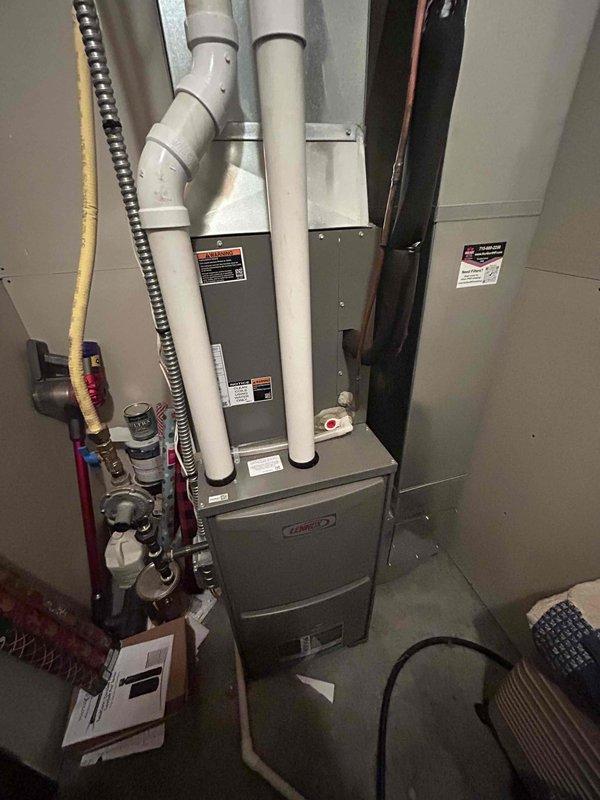 Completed annual cooling maintenance and AC tune-up on 2-year-old Lennox system as part of Family Rewards membership agreement. Performed comprehensive inspection of furnace unit, verified proper operation of all components including gas connections, electrical systems, and PVC venting. All equipment found to be functioning within normal parameters with no issues identified or corrective actions required.