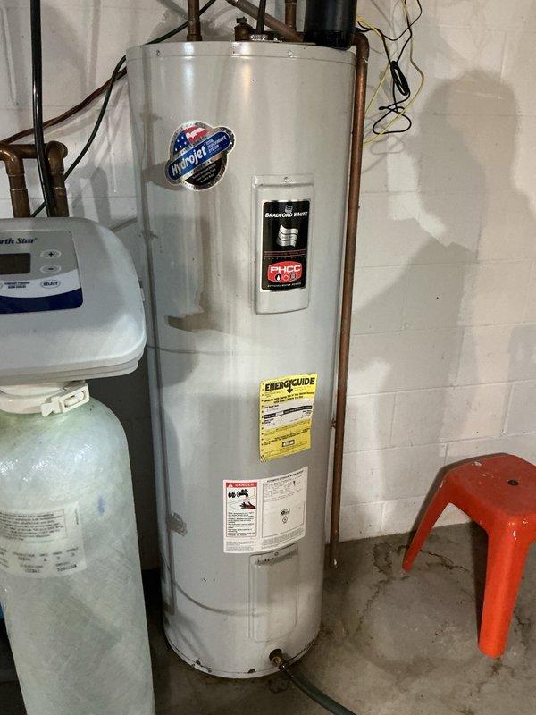 Responded to dispatch for iron staining issues with existing water softener system. Upon inspection, determined that the two-year-old water softener was not adequately addressing iron contamination in the water supply, resulting in brown staining throughout the home. Conducted water hardness testing and documented existing North Star water softener installation. Identified that current system configuration only includes water softening capability and lacks dedicated iron filtration equipment necessary to resolve the staining issue. Recommended installation of iron removal tower to work in conjunction with existing softener system. Submitted request for comprehensive water testing to determine iron levels and appropriate treatment specifications for proper system design.