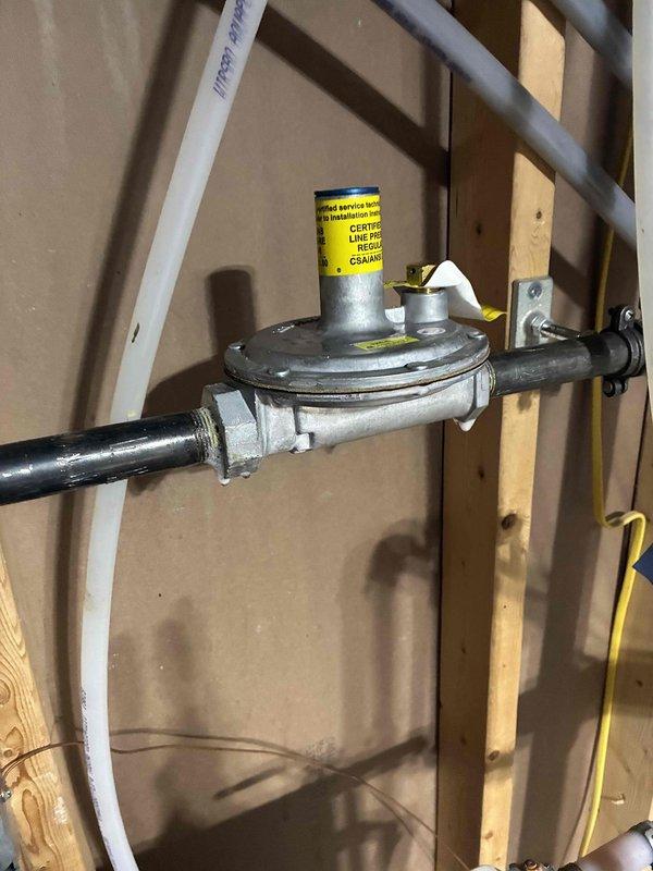 Replaced defective gas regulator on incoming gas line under full warranty coverage. Performed comprehensive leak check on all gas fittings with no leaks detected. Set incoming gas pressure at 8.6 inches water column for both furnace and boiler systems. Adjusted furnace manifold pressures to 1.6 and 3.45 inches water column. Commissioned boiler by setting and verifying high-fire and low-fire combustion levels, achieving optimal efficiency readings of 90.5% with CO levels at 7 ppm and oxygen at 5.1%. All equipment operational and performing to manufacturer specifications.