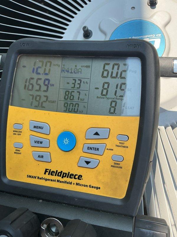 Responded to no cooling complaint on 7-year-old residential air conditioning system. Upon diagnostic evaluation, discovered refrigerant line set had been punctured by a nail during recent flooring installation. System assessment revealed dual capacitor testing significantly below manufacturer specifications. Replaced failed dual capacitor to restore proper compressor and condenser fan motor operation. Used refrigerant manifold gauges to verify system pressures and diagnose refrigerant leak from damaged line set. Provided quote for line set repair, which requires customer approval before scheduling completion of refrigerant circuit restoration.