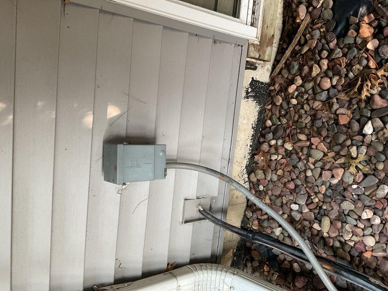 Performed routine cooling maintenance on original 1998 Lennox air conditioning system. Condenser coil was heavily plugged with debris and required thorough cleaning with soap and water to restore proper airflow. All electrical components tested within manufacturer specifications, and system is achieving proper 20-degree temperature split across the evaporator coil. However, inspection revealed evaporator drain pan is actively leaking, with water dripping into the heat exchanger compartment and onto the blower housing, which poses risk of secondary damage to furnace components. Additionally, exterior suction line insulation is severely deteriorated and nearly completely shredded, requiring replacement to prevent efficiency loss and condensation issues. Advised customer that due to age of equipment and developing issues, system replacement should be planned in the near future.