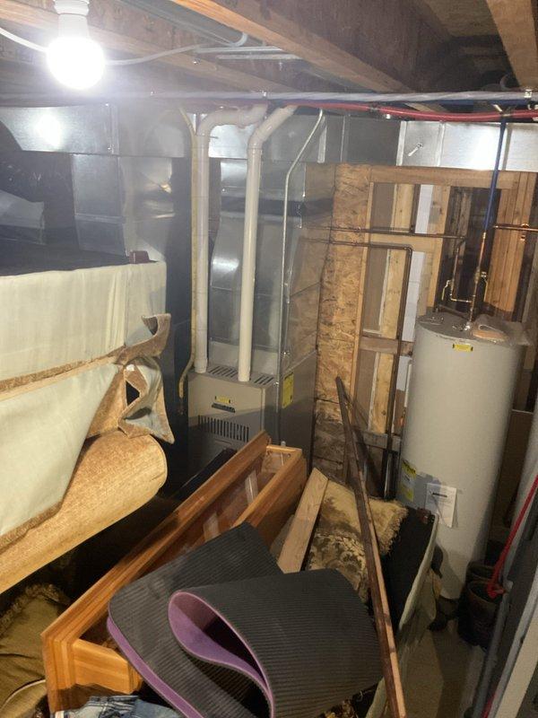 Responded to no cooling call on geothermal HVAC system that would not maintain temperature below 75°F with non-operational loop. Diagnosed and cleared plugged condensate drain line, performed thorough condensate system cleaning, and verified proper drainage function before completing service. Unit restored to normal cooling operation.