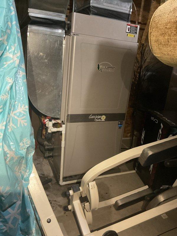 Responded to no cooling call on geothermal HVAC system that would not maintain temperature below 75°F with non-operational loop. Diagnosed and cleared plugged condensate drain line, performed thorough condensate system cleaning, and verified proper drainage function before completing service. Unit restored to normal cooling operation.
