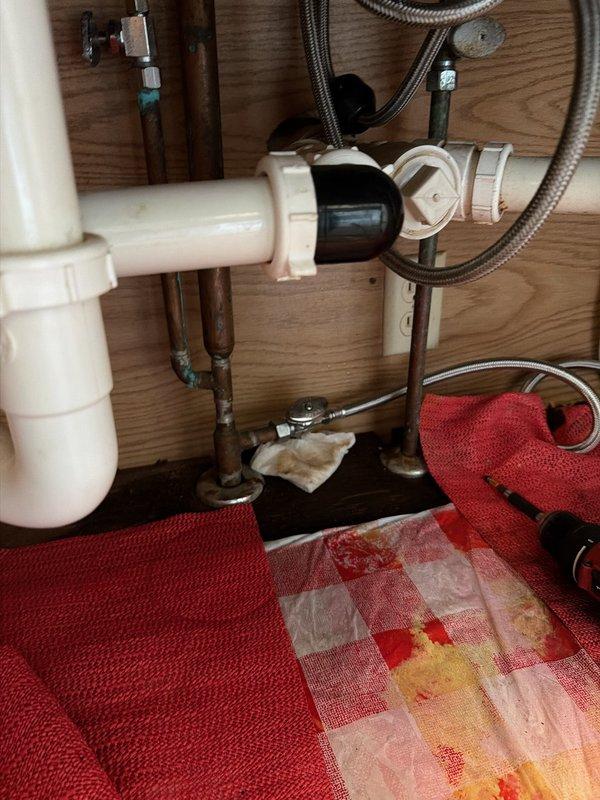 Responded to service call for dishwasher installation where a faulty supply valve was discovered underneath the sink. Upon inspection, identified a leaking valve on the water supply line leading to the dishwasher location. Shut off water supply, removed the defective valve, and installed a new replacement valve with proper compression fittings to ensure leak-free operation. Tested the new valve installation for proper function and verified no leaks were present before completing the work.