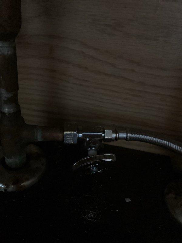 Responded to service call for dishwasher installation where a faulty supply valve was discovered underneath the sink. Upon inspection, identified a leaking valve on the water supply line leading to the dishwasher location. Shut off water supply, removed the defective valve, and installed a new replacement valve with proper compression fittings to ensure leak-free operation. Tested the new valve installation for proper function and verified no leaks were present before completing the work.