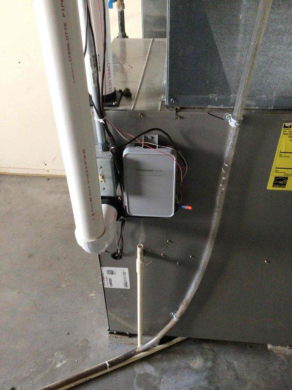 Replaced faulty equipment interface module (EIM) on air handler to restore proper communication between thermostat and HVAC system. Installed new EIM, established connections to thermostat, and verified both heating and cooling operations functioned correctly. Removed five-minute compressor off-delay setting to resolve "waiting for equipment" error message that prevented immediate air conditioning operation. System tested and confirmed operational in both heating and cooling modes. Retained original EIM for diagnostic reference in case of recurring communication issues.