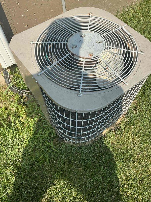 Responded to no cooling complaint on residential air conditioning system. Upon arrival, performed diagnostic assessment of outdoor condensing unit and determined system had lost refrigerant charge of R-22. Verified loss of charge using digital multimeter to test electrical components and system operation. Due to age of equipment and R-22 refrigerant type, recommended comfort advisor consultation for system replacement options rather than recharging obsolete refrigerant.