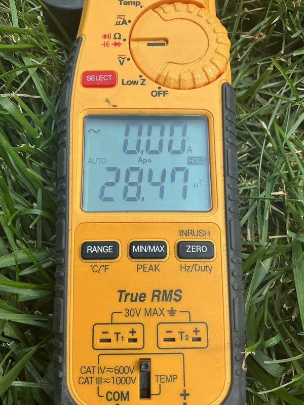 Responded to no cooling complaint on residential air conditioning system. Upon arrival, performed diagnostic assessment of outdoor condensing unit and determined system had lost refrigerant charge of R-22. Verified loss of charge using digital multimeter to test electrical components and system operation. Due to age of equipment and R-22 refrigerant type, recommended comfort advisor consultation for system replacement options rather than recharging obsolete refrigerant.