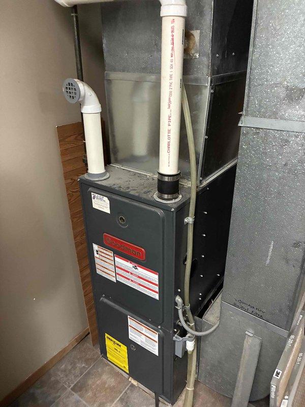 Responded to no cooling complaint on residential split system. Upon arrival, found outdoor condensing unit and indoor air handler operational but system failing to cool adequately. Performed diagnostic evaluation and measured refrigerant pressures, confirming low refrigerant charge on R-22 system. Verified adequate airflow through system by inspecting air filter and evaporator coil for cleanliness and blockages. Confirmed evaporator coil showed no signs of freezing or icing. Determined unit was manufactured in 1990, making it over 30 years old and operating with obsolete R-22 refrigerant. Due to age of equipment, obsolete refrigerant type, and potential for additional system failures, recommended system replacement rather than refrigerant recharge. Coordinated follow-up consultation to discuss replacement options and equipment upgrade.