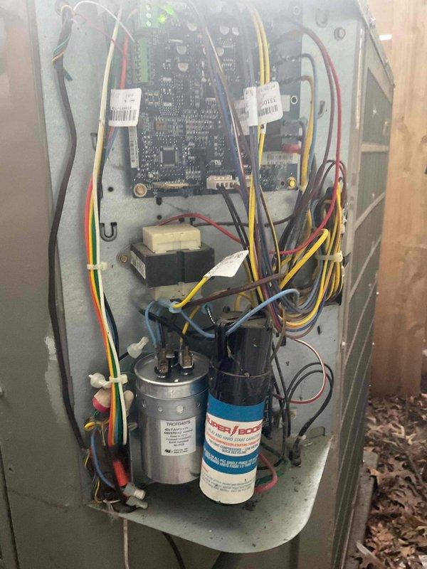 Completed annual cooling system tune-up on residential air conditioning unit. Cleaned condenser coil which was found dirty with accumulated debris, inspected electrical components including dual run capacitor and control board, and noted dirty air filter that customer will replace. All system components including wiring, connections, and mechanical elements were inspected and unit is operating properly.
