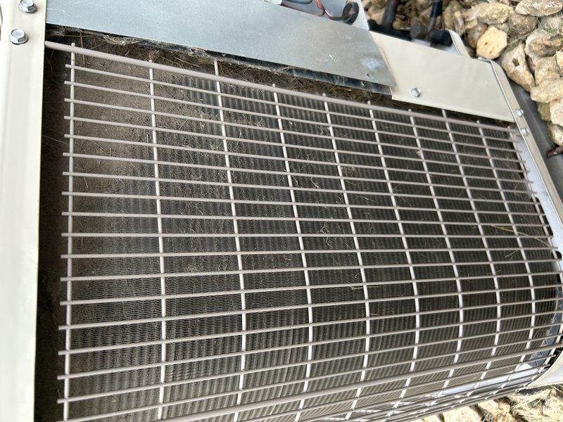 Completed comprehensive air conditioning tuneup and preventive maintenance on residential dual-zone system. Performed operational testing of both heating and cooling modes. Replaced air filter and verified proper operation of zone dampers throughout system. Conducted thorough inspection of blower compartment, checking motor, bearings, and electrical connections. Serviced outdoor condensing unit by cleaning condenser coils to remove accumulated debris and ensure optimal heat transfer efficiency. Measured and recorded refrigerant pressures and temperatures on both high and low sides of system, confirming proper charge levels and system performance within manufacturer specifications. All components tested and found operating correctly with no deficiencies noted.