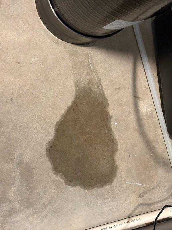 Responded to callback for water softener experiencing intermittent leaking one to two times per month since recent installation. Upon inspection, identified source of leak as failed discharge adapter with visible split causing water to saturate carpeted floor beneath unit. Removed damaged discharge adapter and installed new replacement component. Verified all connections secure and tested system operation to confirm leak resolved. No further issues detected at time of completion.