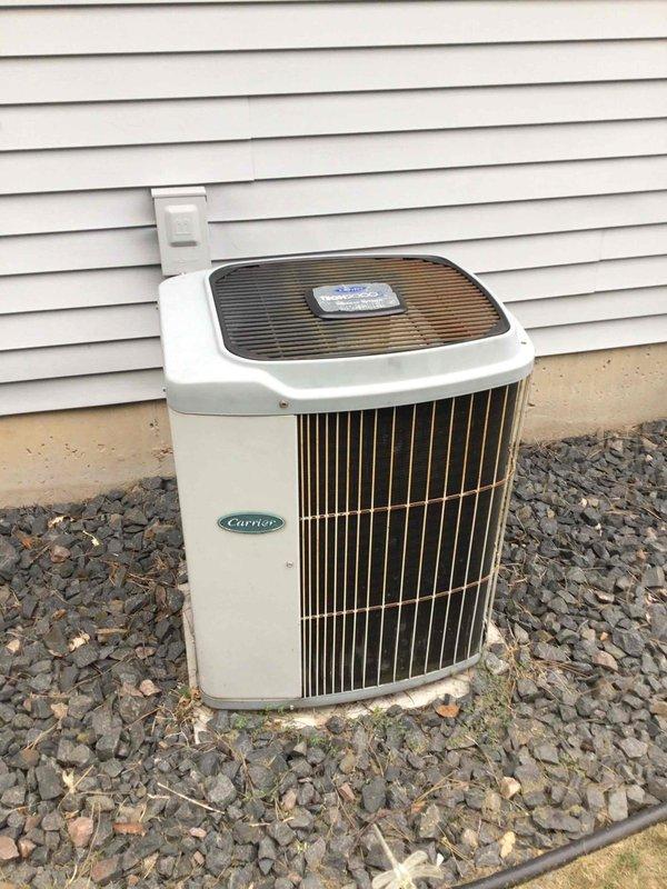 Completed Family Rewards cooling maintenance visit on aging Carrier air conditioning system with gas furnace. Performed comprehensive AC tuneup including filter replacement and thorough washing of outdoor condensing unit. System evaluated and found to be operating within normal parameters for equipment age. No deficiencies or repairs required at this time.