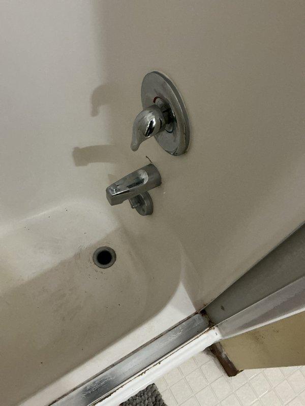 Responded to a water leak originating from an upstairs shower trap that was dripping into the downstairs bathroom. Upon inspection, identified a faulty tub waste and overflow assembly as the source of the leak. Presented repair options to the customer and proceeded with the replacement of the complete tub waste and overflow system. Successfully installed new chrome-plated waste and overflow assembly, ensuring proper sealing and drainage function. Tested the installation for leaks and verified the repair eliminated water intrusion to the lower level.