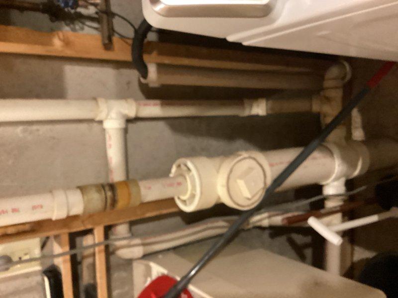 Responded to kitchen sink leak originating from malfunctioning garbage disposal unit. Upon inspection, found disposal motor buzzing and water actively leaking from the unit into the cabinet below. Removed failed disposal and installed new Badger 5 garbage disposal unit, reconnected plumbing connections, tested system for proper operation and verified no leaks present.