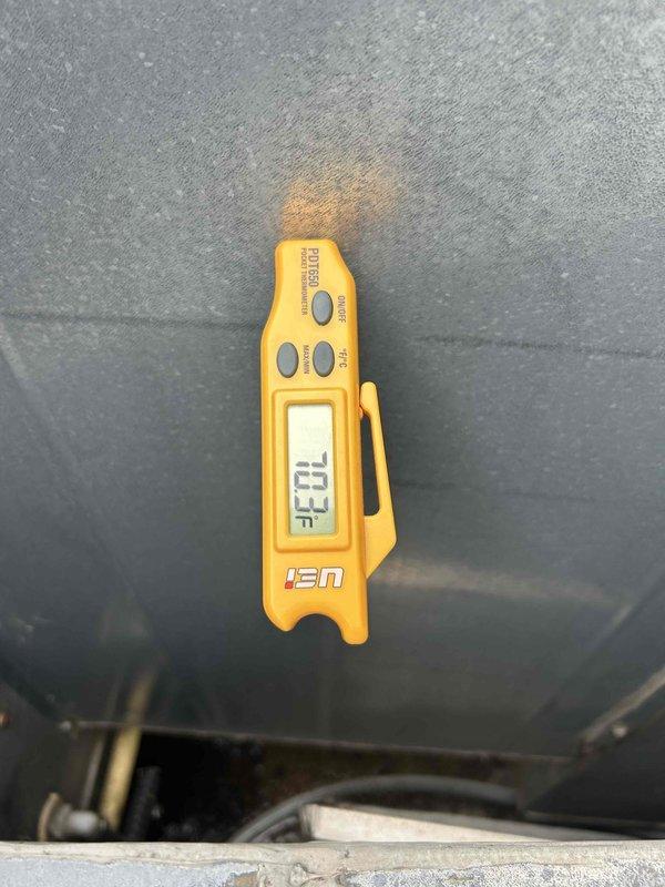 Responded to callback for burning smell and no cooling complaint on warehouse A/C system following recent belt and filter replacement. Upon arrival, thoroughly inspected electrical connections, belt tension and alignment, and all mechanical components. Started unit and monitored operation for 20 minutes. System operated normally with proper cooling performance verified at 33.5°F supply air temperature and 117.3°F return air temperature. No burning odor detected during inspection or operation. All components functioning within normal parameters. Advised to monitor system and contact if issues recur.