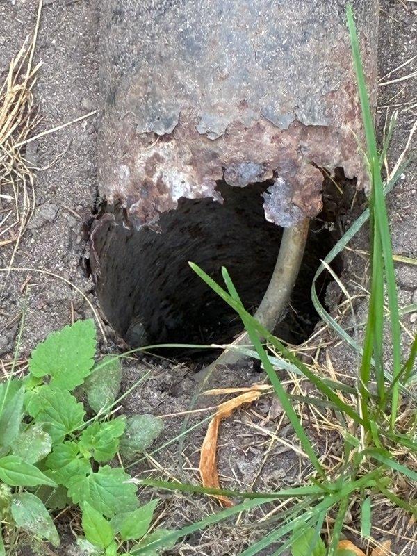 Responded to service call for gas line capping at outdoor BBQ location. Successfully capped abandoned gas line extending from ground-level access point, securing the line to prevent gas leakage and ensuring compliance with safety standards. The existing metal housing showed significant corrosion and weathering, with the gas pipe assembly requiring proper termination and sealing to eliminate potential hazards from the decommissioned BBQ connection.