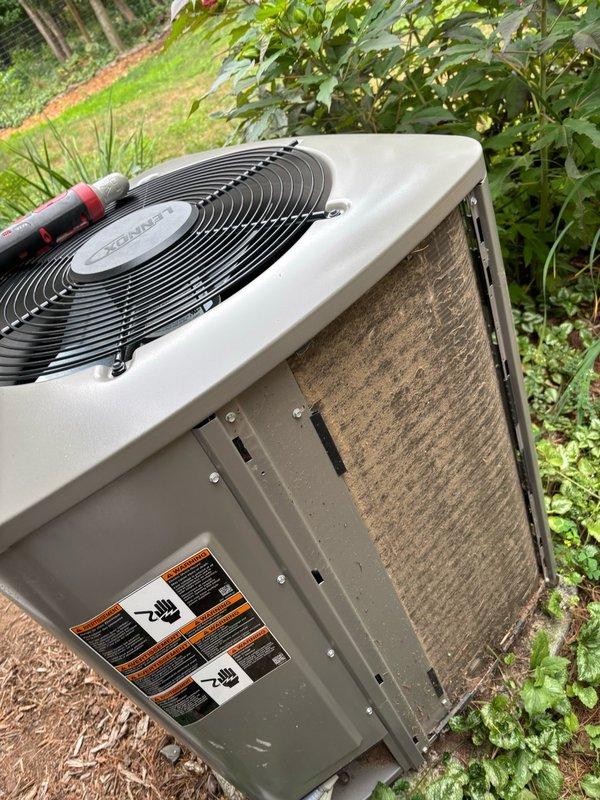 Performed comprehensive AC maintenance under agreement plan. Removed and cleaned condenser panels, which showed minor buildup; thoroughly soaked and cleaned outdoor unit exterior. Inspected inverter components with no issues identified. Replaced heavily soiled air filter and recommended increasing filter replacement frequency from six months to every three months for optimal system performance. Flushed evaporator coil drain line with 20 ounces of water and installed drain pan tablet to prevent algae growth and maintain proper condensate drainage.