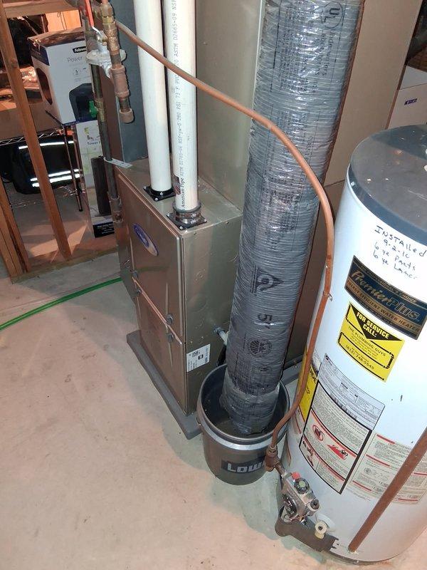 Responded to no cooling complaint on Carrier system. Diagnosed ECM blower motor failure after observing humming noise from furnace with no air movement, while outdoor unit operated normally when thermostat wires were jumped. Replaced defective ECM blower motor and restored system to normal operation. Discussed system replacement options due to unit age and provided information for future equipment upgrade consideration.